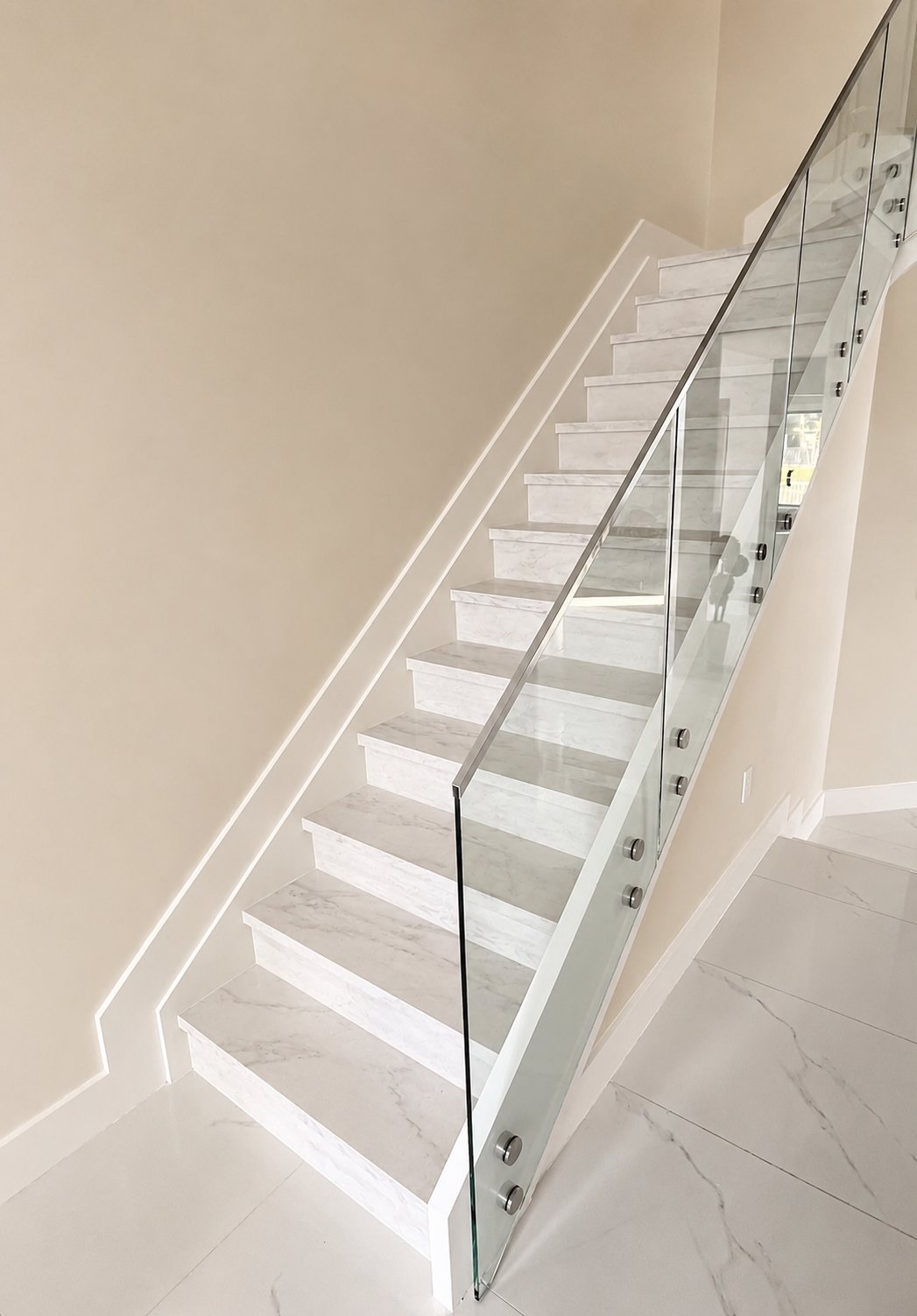 Glass stair railing and premium interior glass project by Alston York Home Improvement